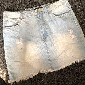 Semi-destroyed denim skirt